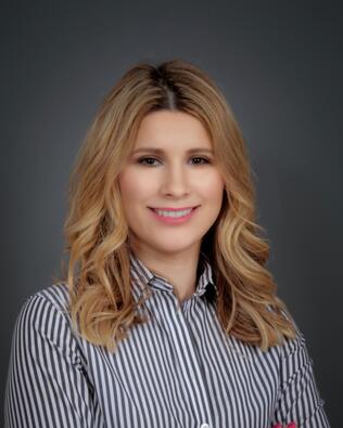 Headshot of Lenia Leal