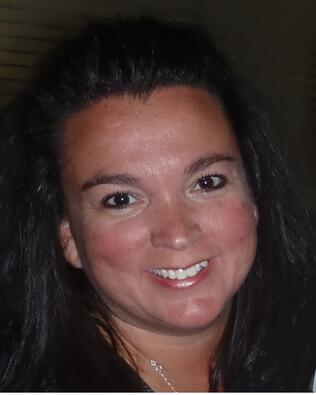 Headshot of Kelly West