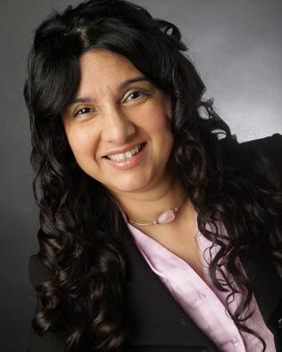 Headshot of Claudia A. Torres