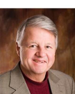 Headshot of Ron Brewer