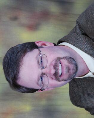 Headshot of Dennis McCall