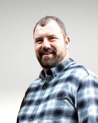 Headshot of Brandon True