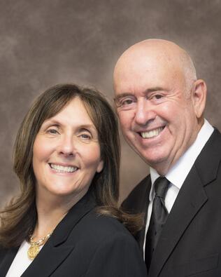 Headshot of Andrea & Harry Mesh Team