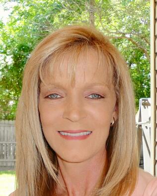 Headshot of Paula Carlton-Killane - Exec Broker