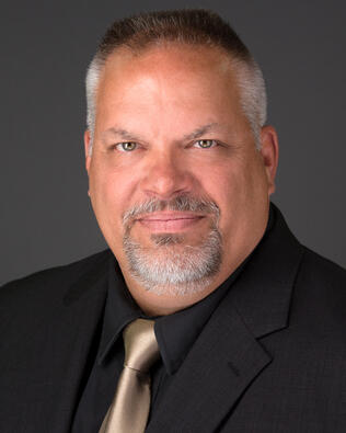 Headshot of Thomas Koeneman