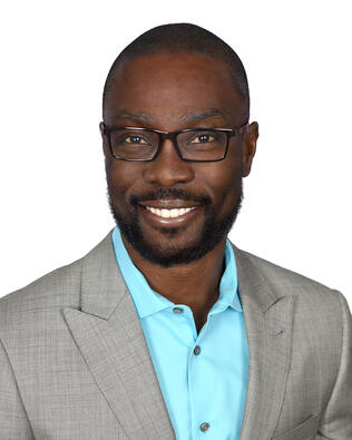 Headshot of Tayo Ayandele