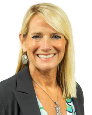 Headshot of April Hugh