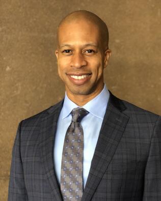 Headshot of Justin Woodson
