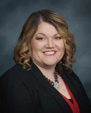 Headshot of Angie Muehlfeld