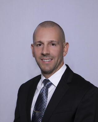 Headshot of Michael Corda