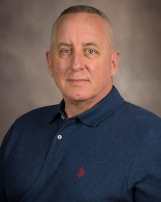 Headshot of John Fischer