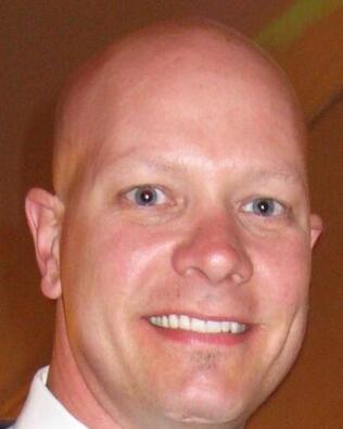 Headshot of Mike Currin