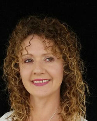 Headshot of Suzanne Gonzalez