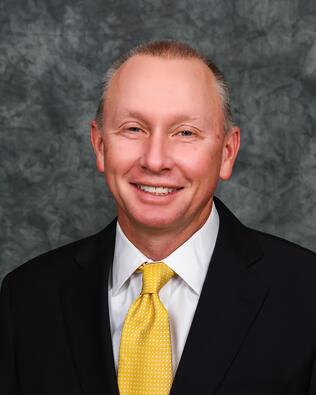 Headshot of Charles Commander, Jr.