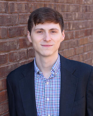 Headshot of Destin Allen