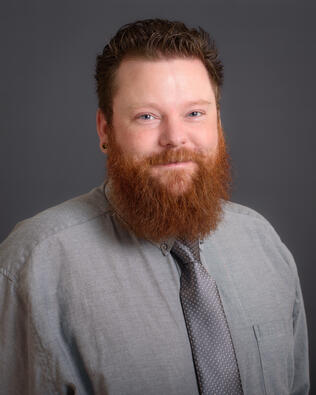 Headshot of Joshua Blackburn