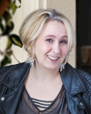 Headshot of Kris Vanyi