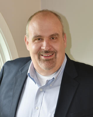 Headshot of Patrick DeWalt