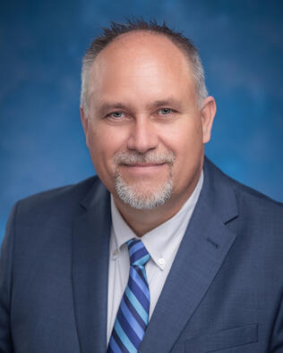 Headshot of The Hill Team