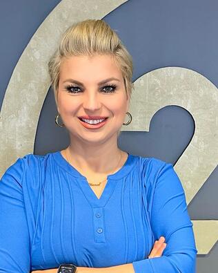 Headshot of Alina Huxtable