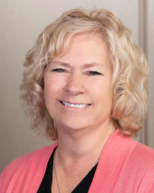 Headshot of Laura Toms
