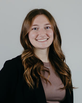 Headshot of Cloey Horns