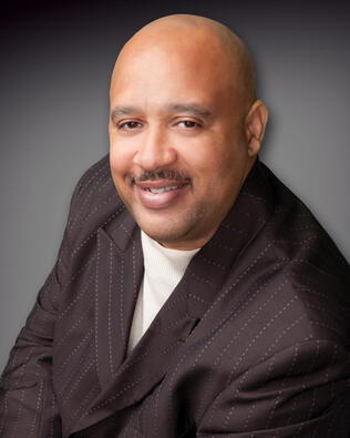 Headshot of Sean Reid
