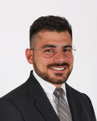 Headshot of Benjamin Goldblatt