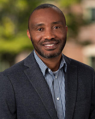 Headshot of Vincent Aginde