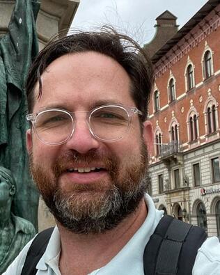 Headshot of Adam Blumenthal