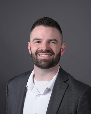 Headshot of Justin Padley
