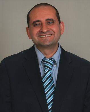 Headshot of Emad Abraham