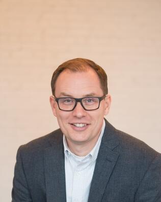 Headshot of Michael Misjuns