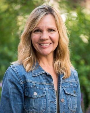 Headshot of Christie Whitman