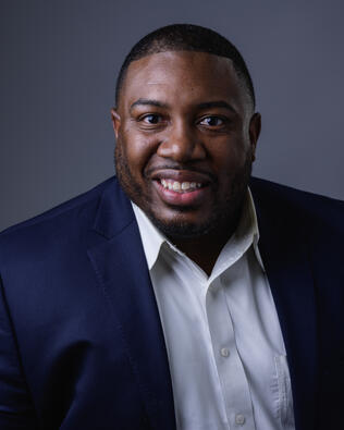 Headshot of Justin Brown