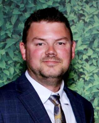 Headshot of Jason Hartley