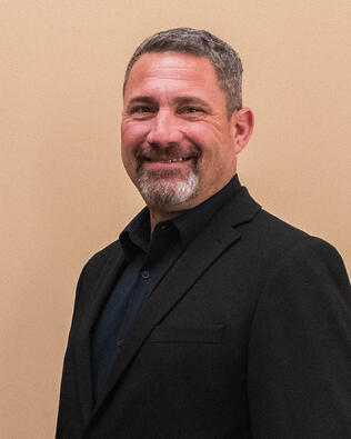 Headshot of Ron Knowles