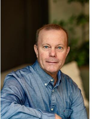 Headshot of Thomas Torkelson