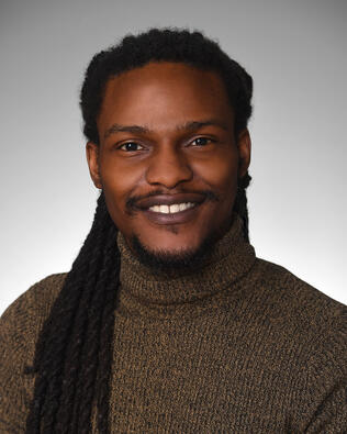 Headshot of Jovan Tate