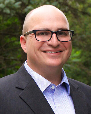 Headshot of Harrison Folk