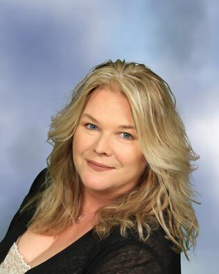 Headshot of Nancey Cain