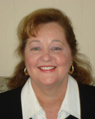 Headshot of Nancy Batal-Sholler
