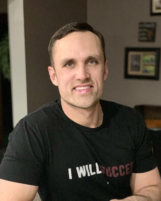 Headshot of Adam Currie