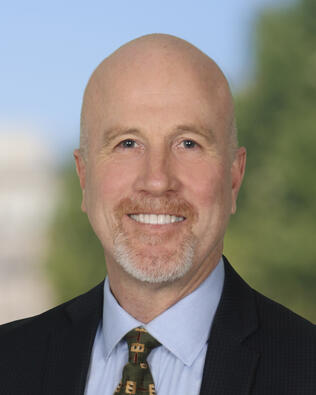 Headshot of Tom Mulkerin