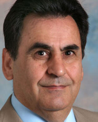 Headshot of Amir Mikail