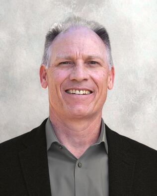 Headshot of Justin Tanner