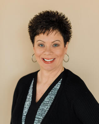 Headshot of Kristen Seedall