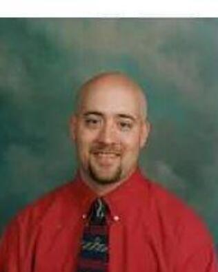 Headshot of Justin Gowan