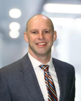 Headshot of Geoffrey Thacker