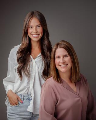 Headshot of Ashlyn and Sara - Real Estate Team